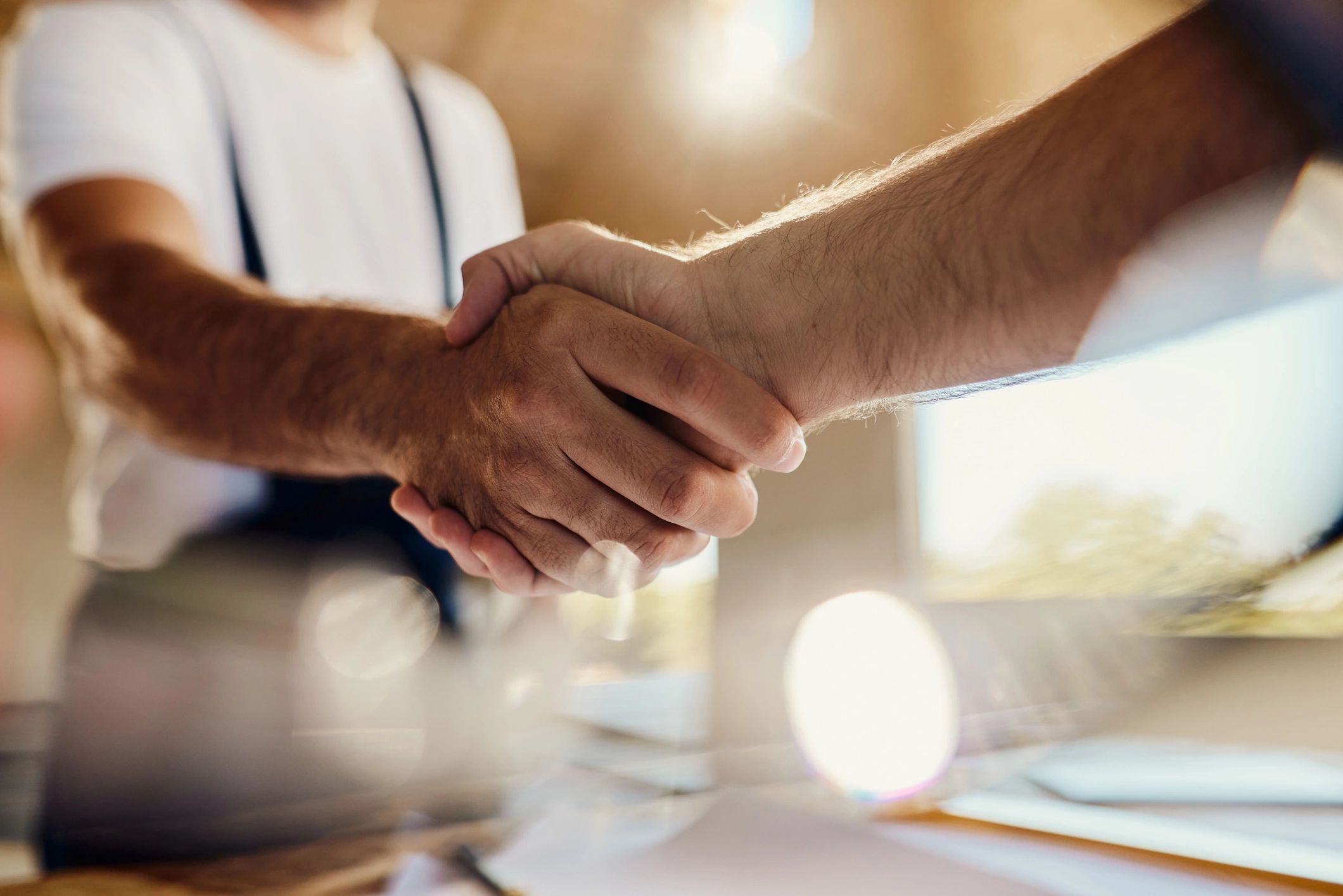 land investment handshake